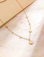 Gold Toned Floral Pendant